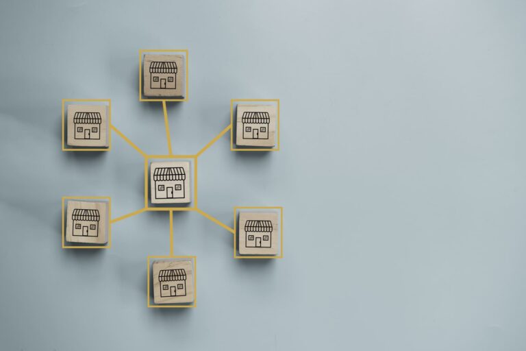 Wooden blocks connected with lines showing a franchise network concept