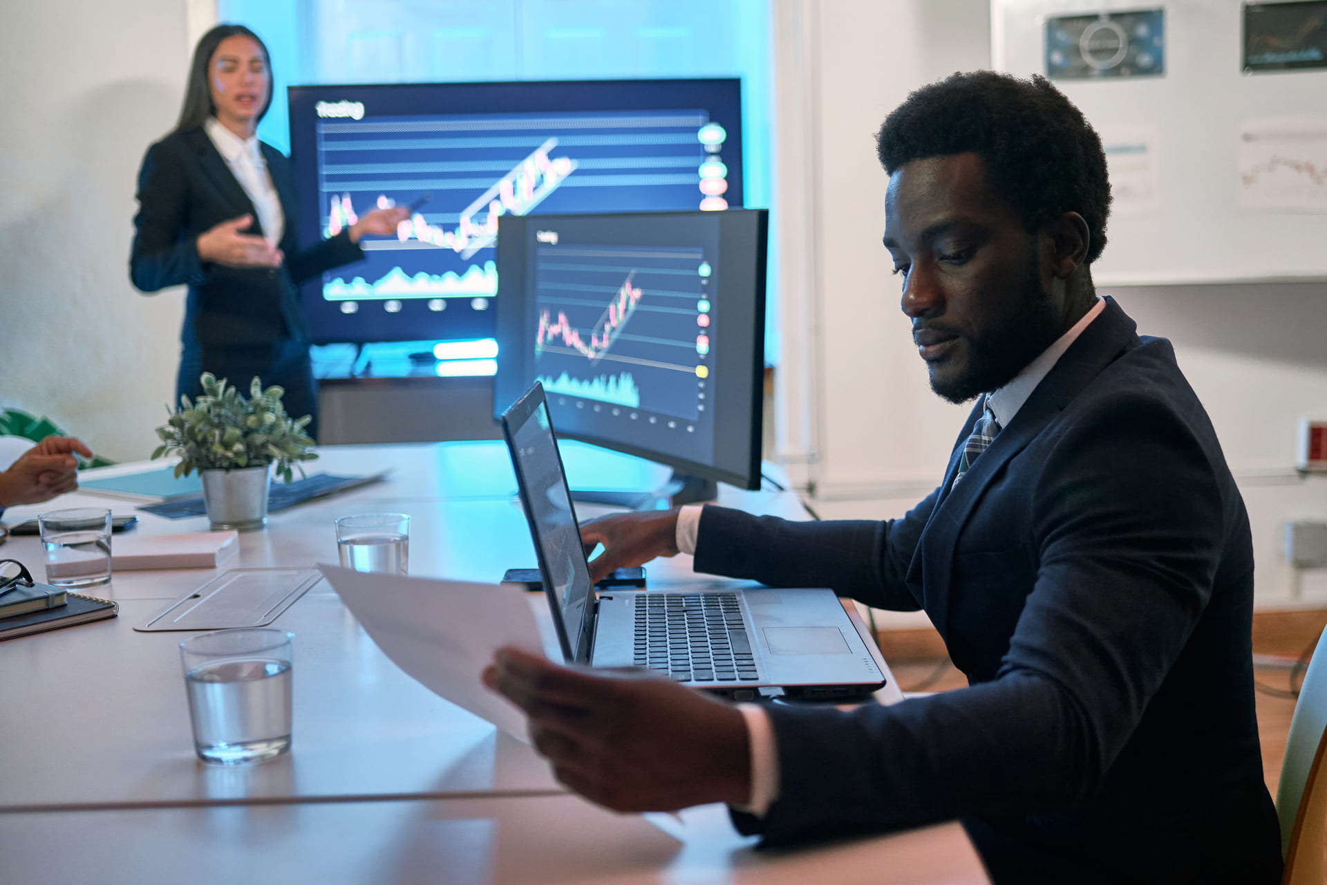 Businessman in meeting reviewing documents