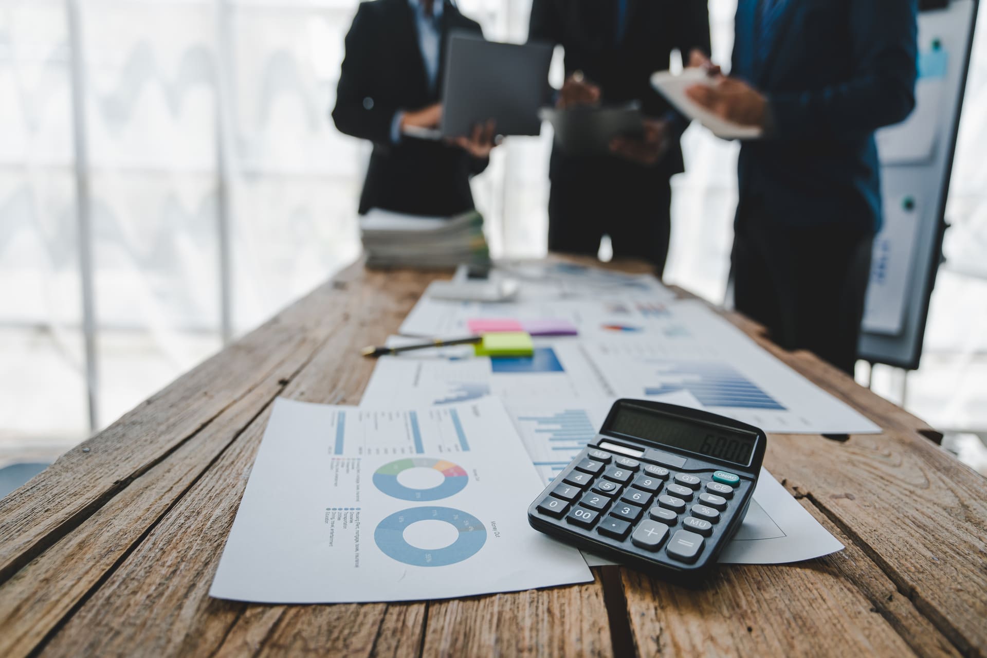business-professionals-analyzing-data-at-office