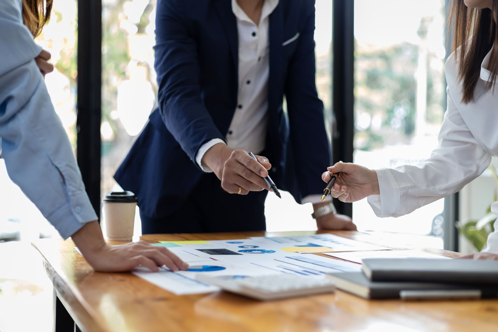 business-team-collaboration-analyzing-charts