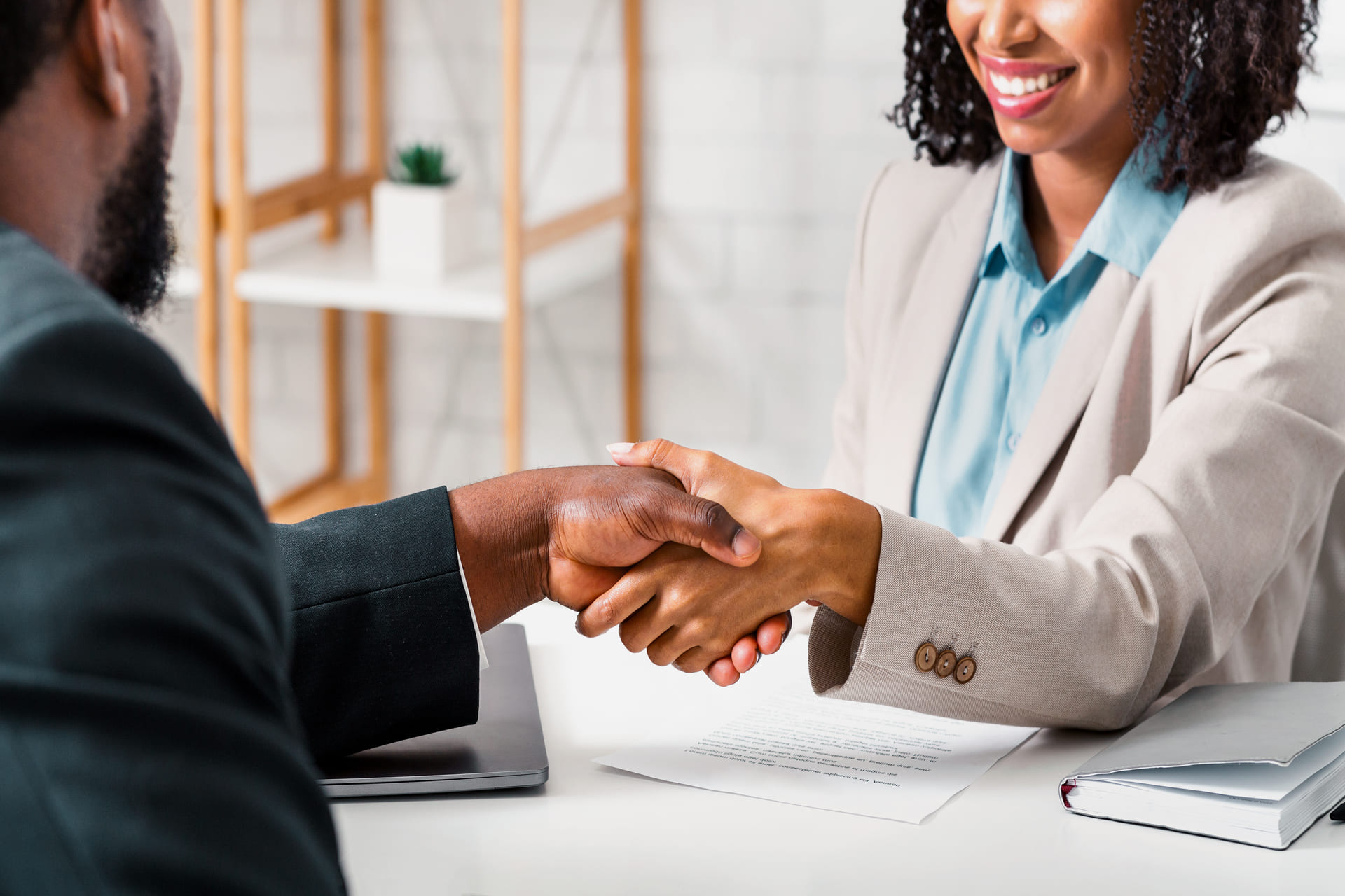 professional-handshake-demonstrating-agreement-in-office