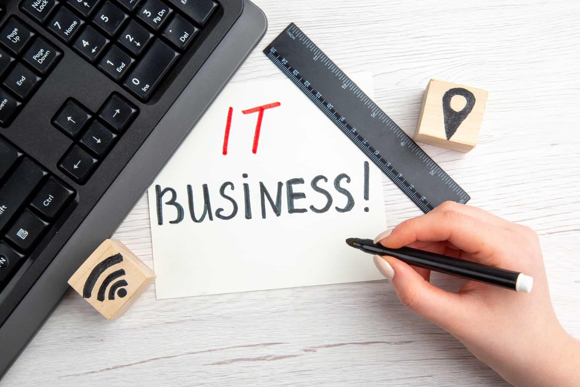 top-view-it-business-writing-on-white-background