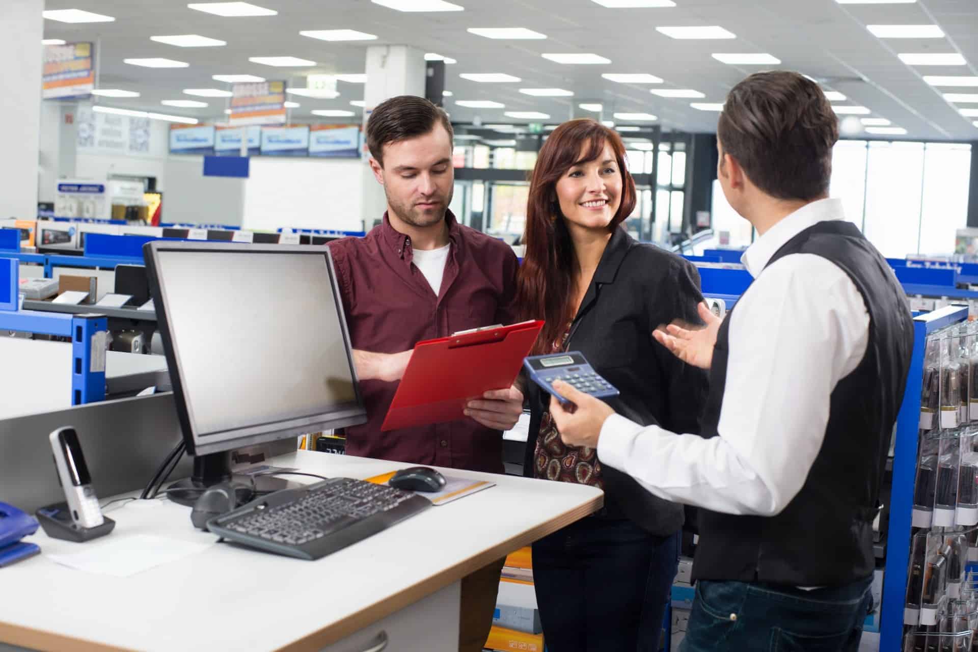 Retail-customer-discussing-a-purchase-with-store-staff