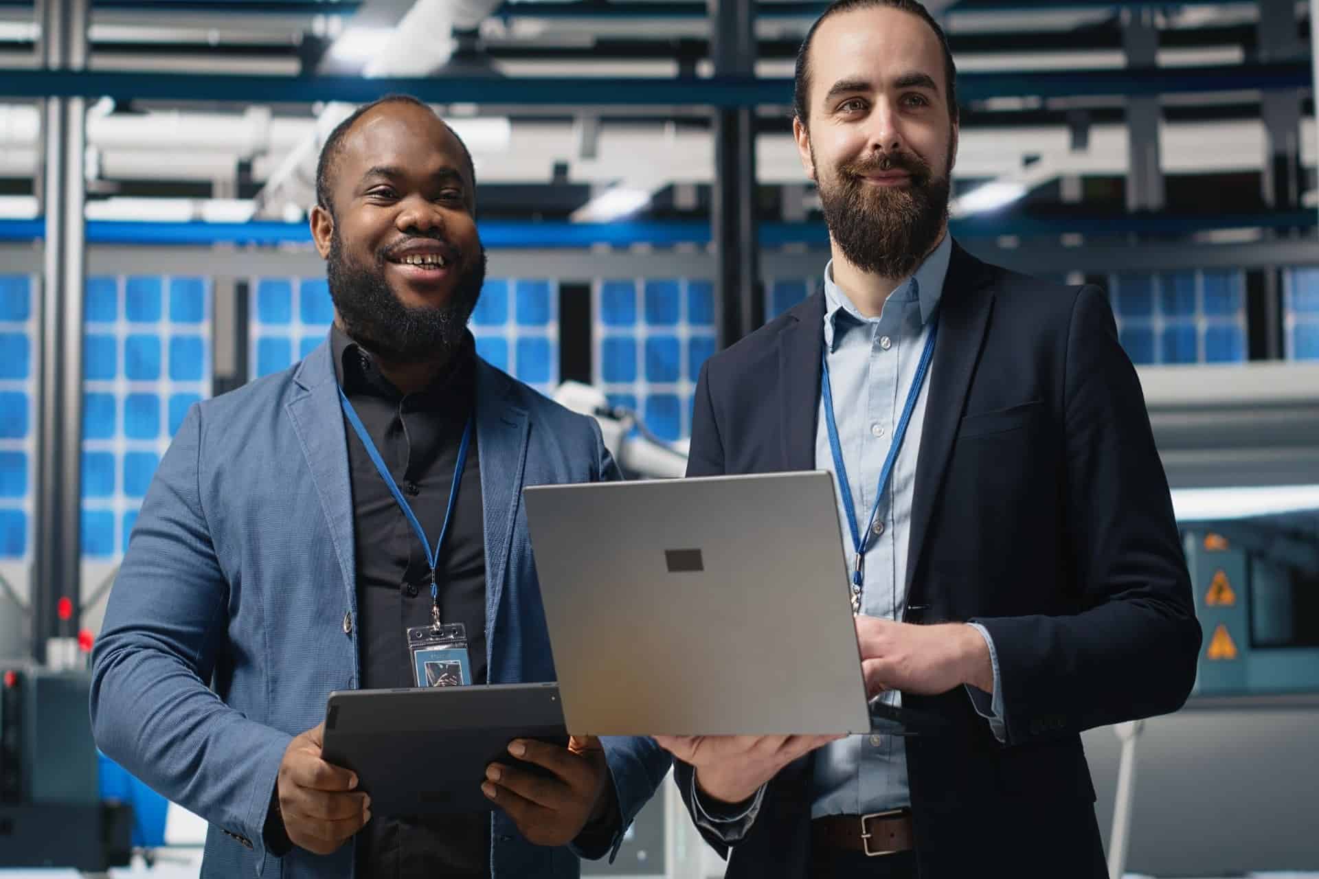 Two-business-professionals-working-together-with-a-laptop